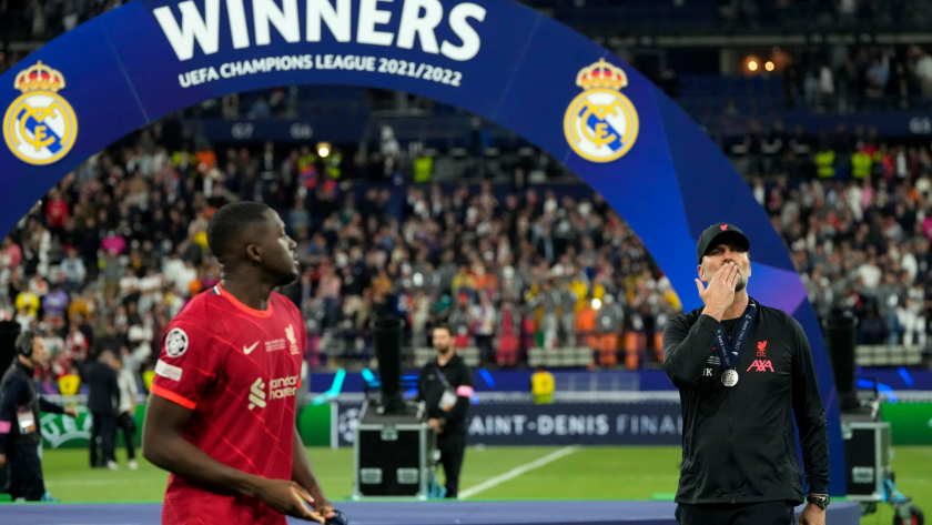 Liverpool's manager Jurgen Klopp blows a kiss to the stands at the end of the Champions League final soccer match between Liverpool and Real Madrid at the Stade de France in Saint Denis near Paris, Saturday, May 28, 2022. Real Madrid defeated Liverpool 1-0. (AP Photo/Manu Fernandez)