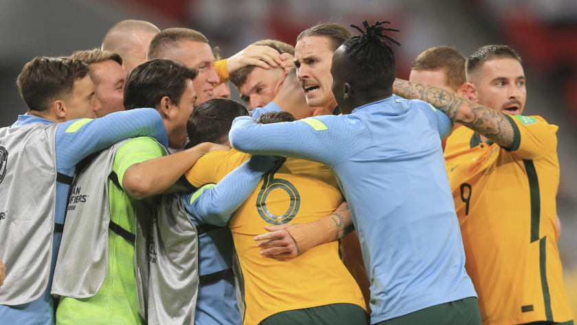 Australia's players clebrate after a qualifying match between United Arab Emirates and Australia in Al Rayyan, Qatar, Tuesday, June 7 2022. (AP Photo/Hussein Sayed)