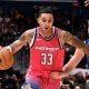 WASHINGTON, DC -  NOVEMBER 10: Kyle Kuzma #33 of the Washington Wizards drives to the basket during the game against the Dallas Mavericks on November 10, 2022 at Capital One Arena in Washington, DC. NOTE TO USER: User expressly acknowledges and agrees that, by downloading and or using this Photograph, user is consenting to the terms and conditions of the Getty Images License Agreement. Mandatory Copyright Notice: Copyright 2022 NBAE (Photo by David Dow/NBAE via Getty Images)